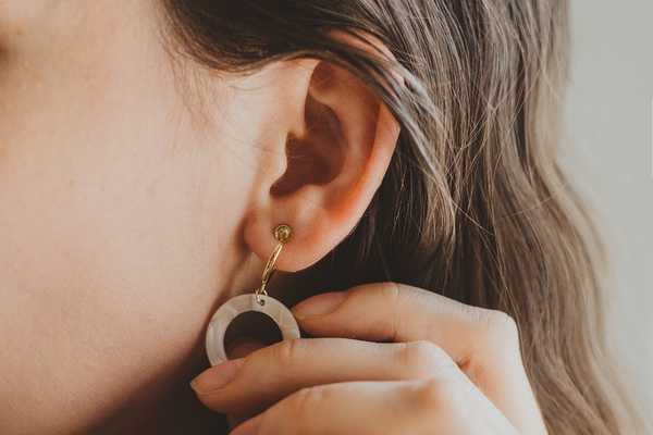 Girl with ear piercing